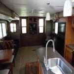 MOUNTAIN GETAWAY 31' DOUBLE SLIDE TRAILER STATIONARY RENTAL IN CEDARPINES PARK