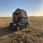 Infiniti QX4 Mid-Size SUV with Smittybilt Overlander XL Roof Top Tent & Tent Annex