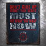 Never Outgunned: Most Now Vintage Tin Sign