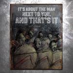 Spartan The Man Next To You Vintage Tin Sign